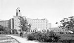 Vinoy Hotel with walkway and foliage by Francis G. Wagner and Nelson Poynter Memorial Library