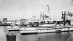 Tugboats docked, Soreno and Vinoy in background by Francis G. Wagner and Nelson Poynter Memorial Library