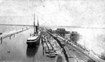 View from port with ships and railroad cars