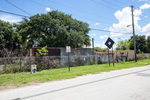 Fenced Industrial Area with Signage, Tampa, Florida