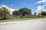 Industrial Site with Fence and Signage, Tampa, Florida