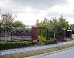 Brick and Iron Fence along a Walkway on 12th Avenue in Tampa, Florida